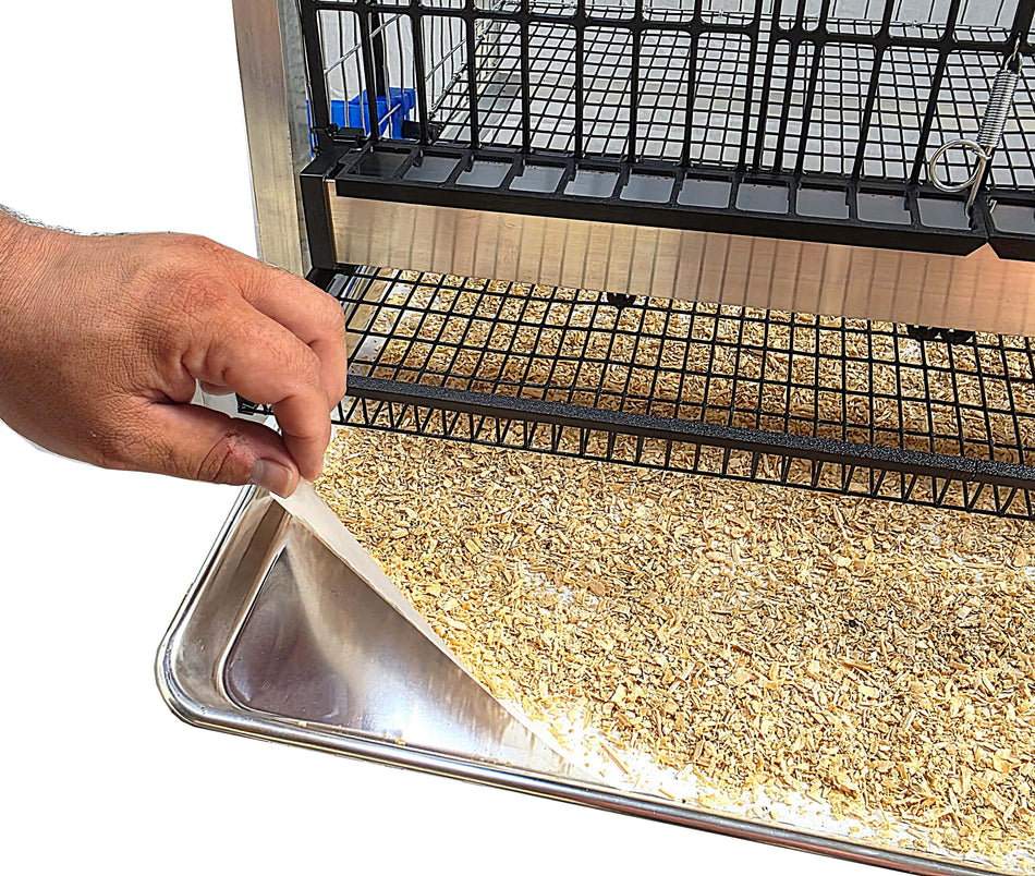 Disposable parchment liners sized 16 by 24 inches for quail cage litter trays
